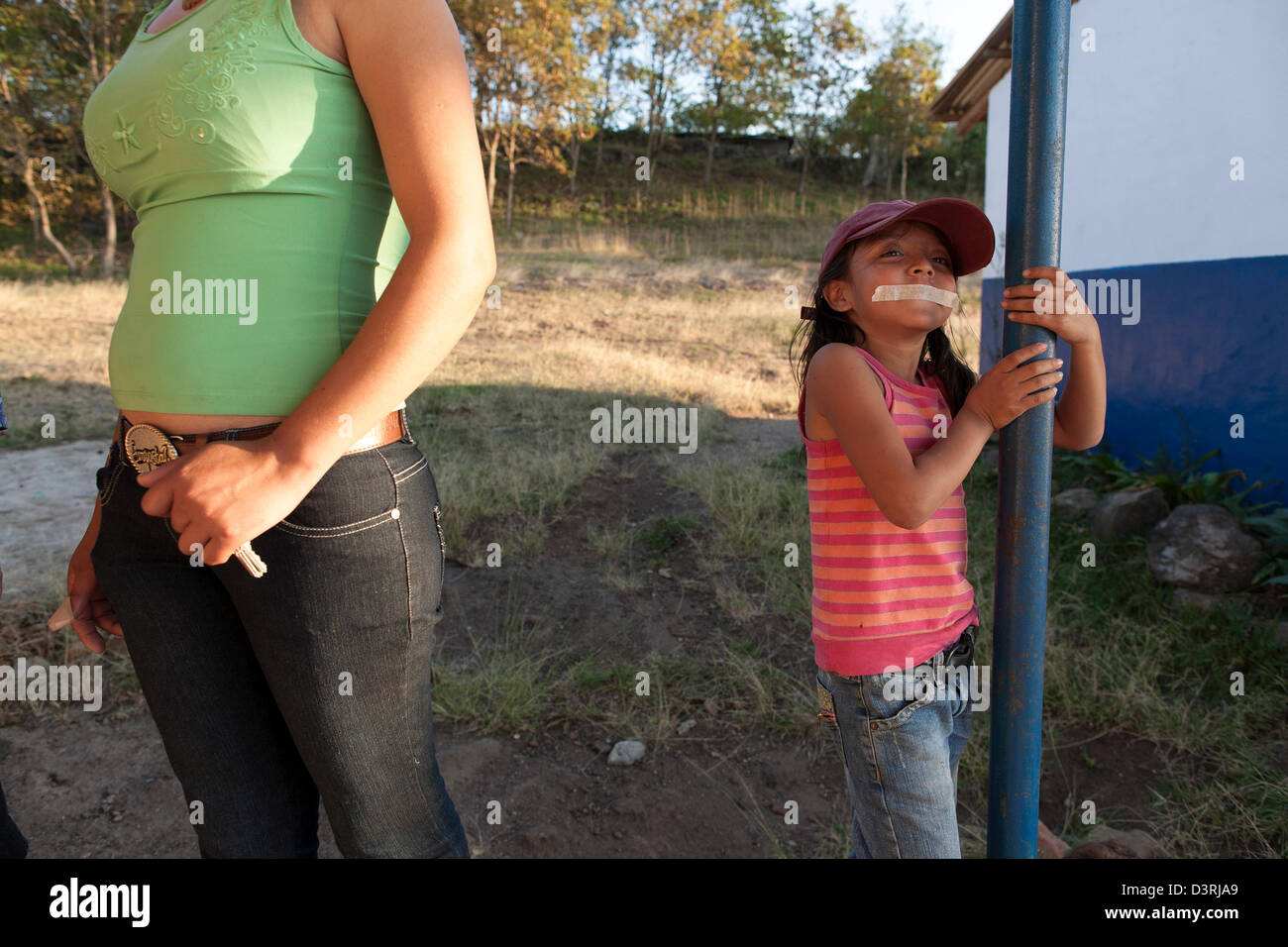 A Young Girl Has Her Mouth Taped And Gagged For Fun Outside Rural Stock