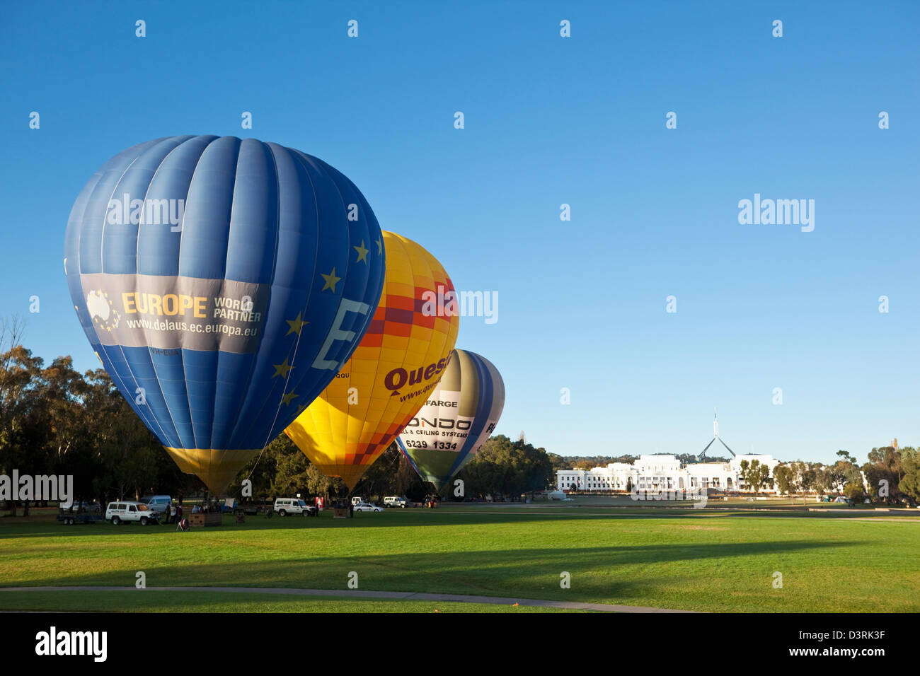 Hot air balloons being launched in front of the old Parliament House. Canberra, Australian Capital Territory (ACT), Australia Stock Photo