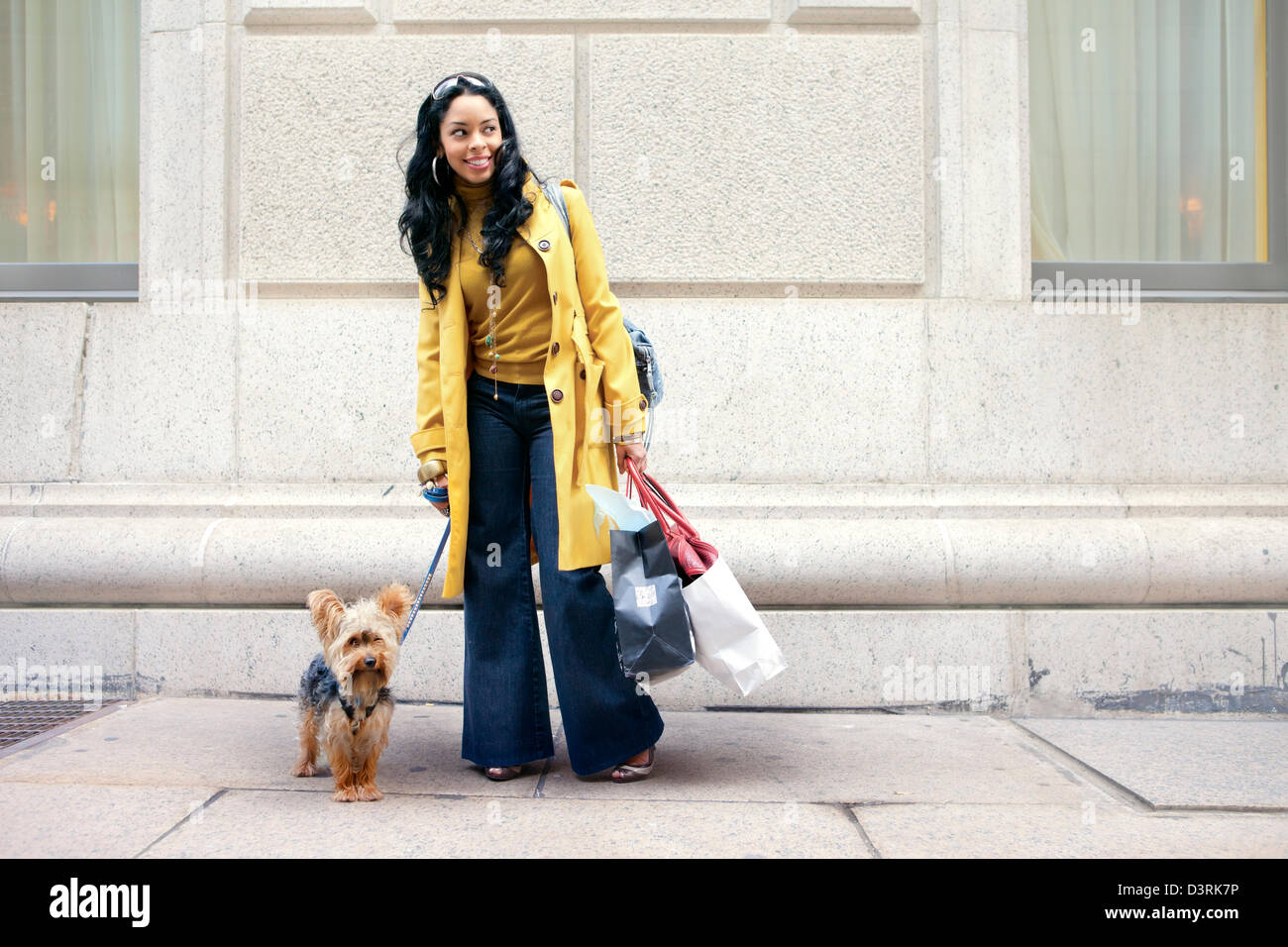 Hispanic/Latina woman having fun shopping in New York City Stock Photo