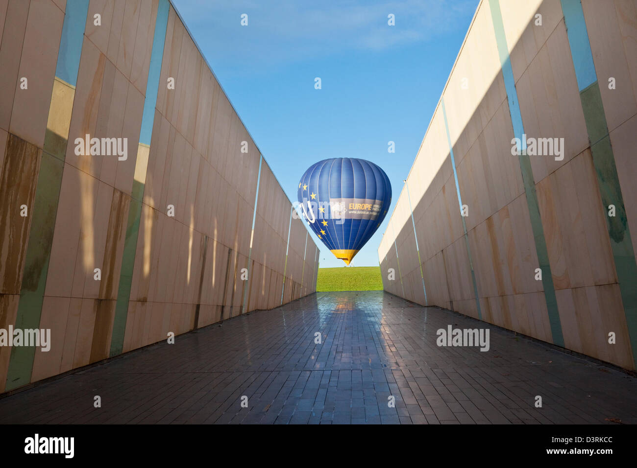 View of hot air balloon from the marble walkway at Commonwealth Place. Canberra, Australian Capital Territory (ACT), Australia Stock Photo