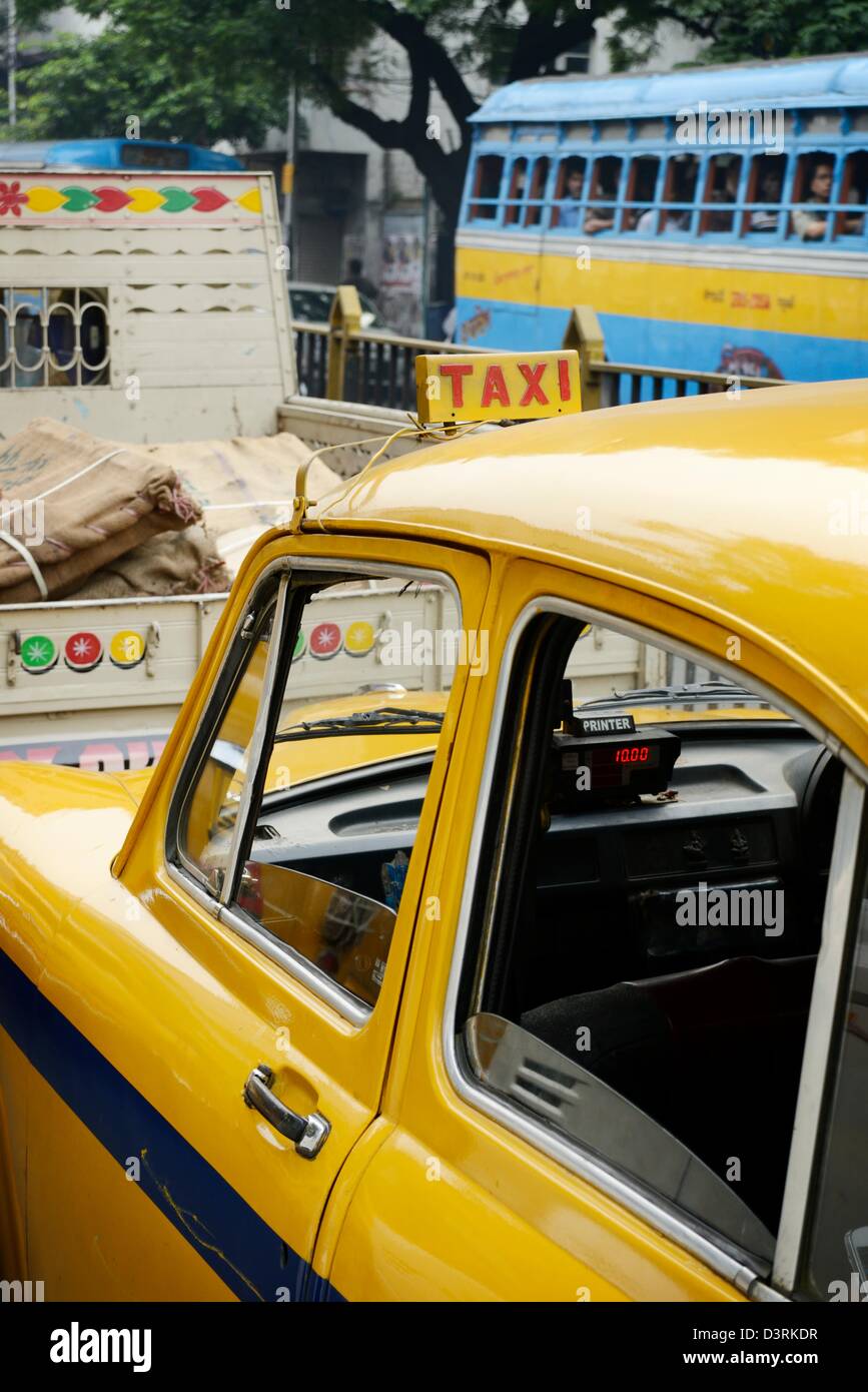 Traffic Involving Yellow Taxi With Ten Rupees On The Meter A Bus And