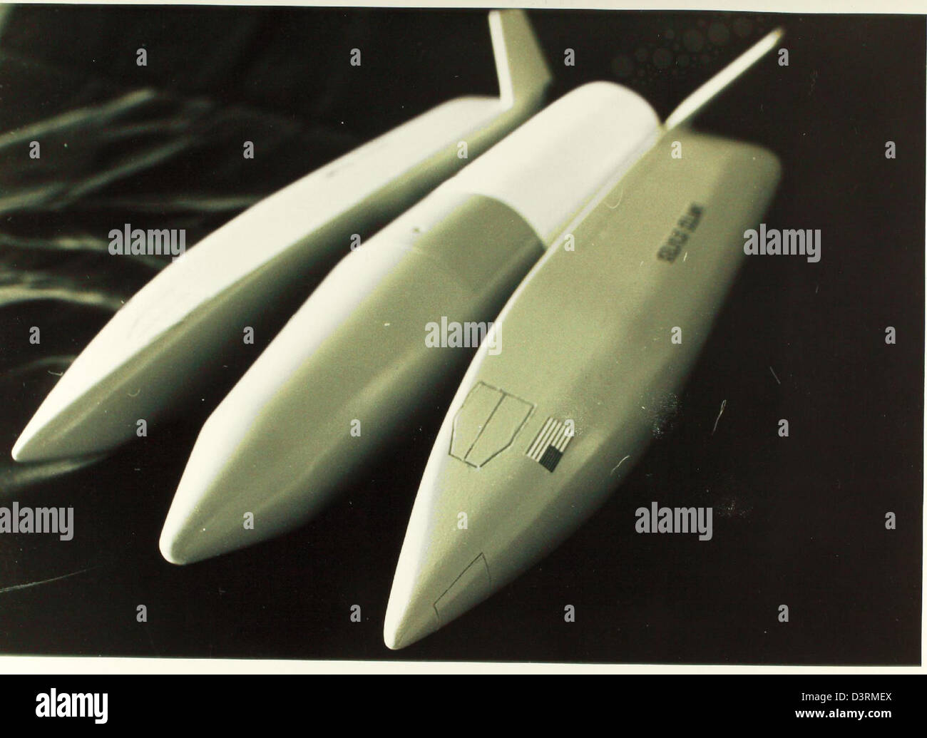 A glossy photo from NASA depicts the Space Shuttle Program, active from ...