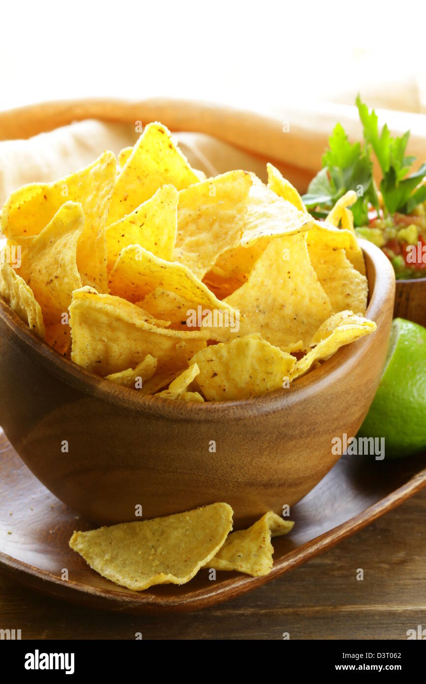 corn tortilla chips in a wooden bowl Stock Photo