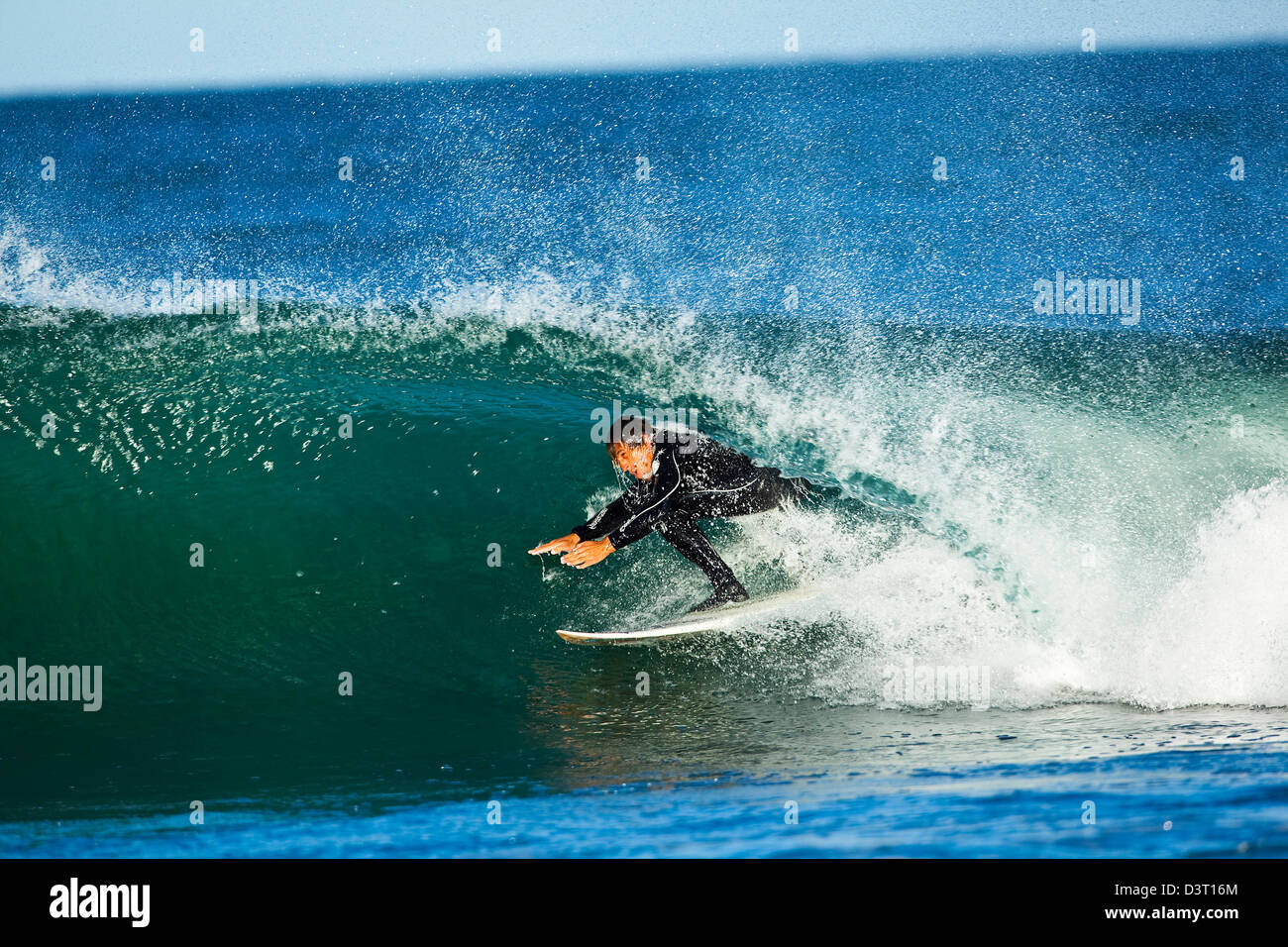 Surfing action, man on wave, Jeffreys Bay, South Africa Stock Photo