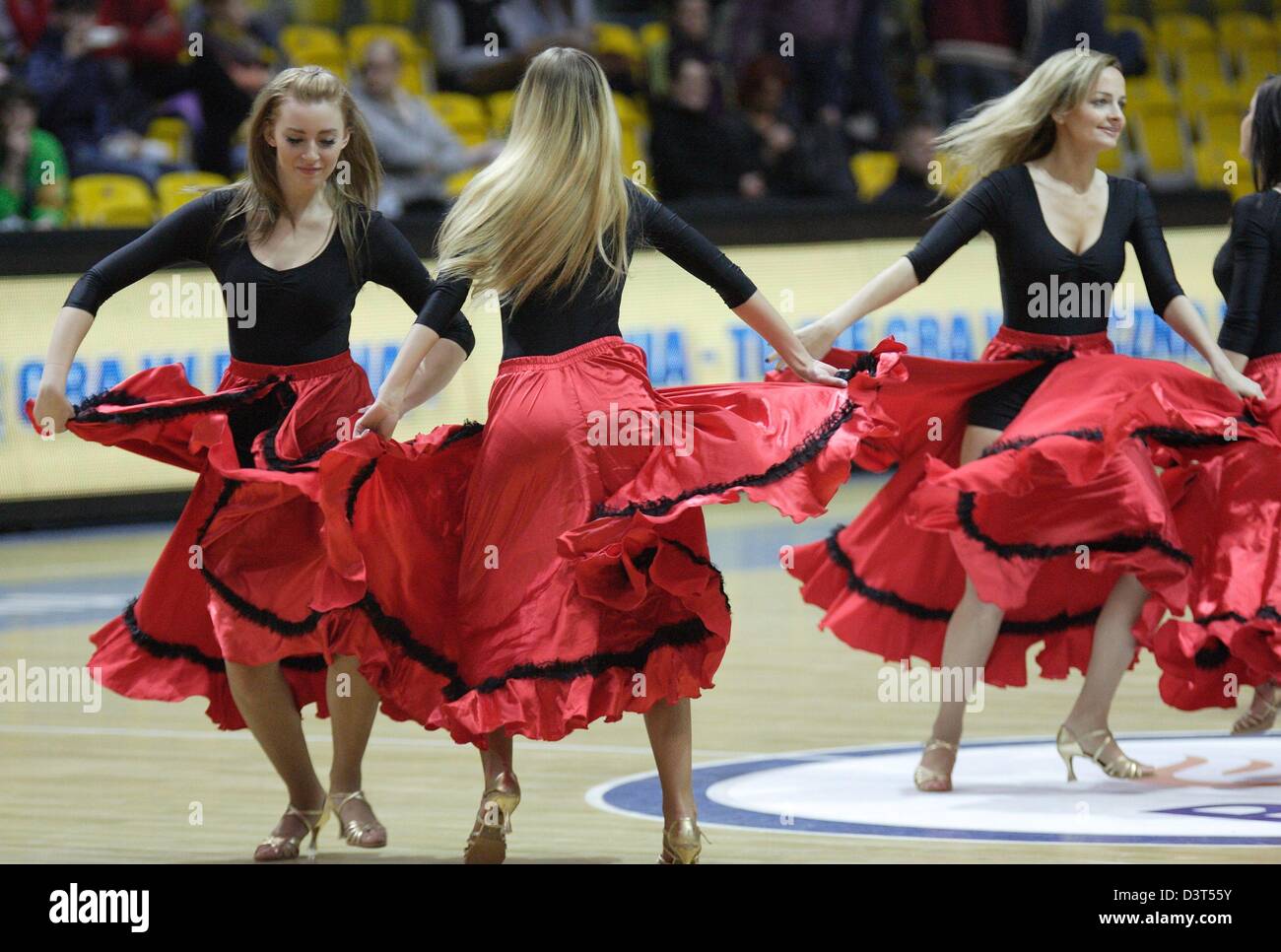 Poland 24th, February 2013 Handball: Final Four of the PGNiG Polish Cup. Vistal Laczpol Gdynia v KPR Ruch Chorzow game for 3th place in the Cup at HSW sports hall in Gdynia.The 'Gdynia Cheerleaders' perform during the half-time Stock Photo