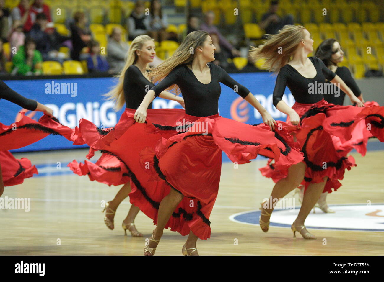 Poland 24th, February 2013 Handball: Final Four of the PGNiG Polish Cup. Vistal Laczpol Gdynia v KPR Ruch Chorzow game for 3th place in the Cup at HSW sports hall in Gdynia.The 'Gdynia Cheerleaders' perform during the half-time Stock Photo