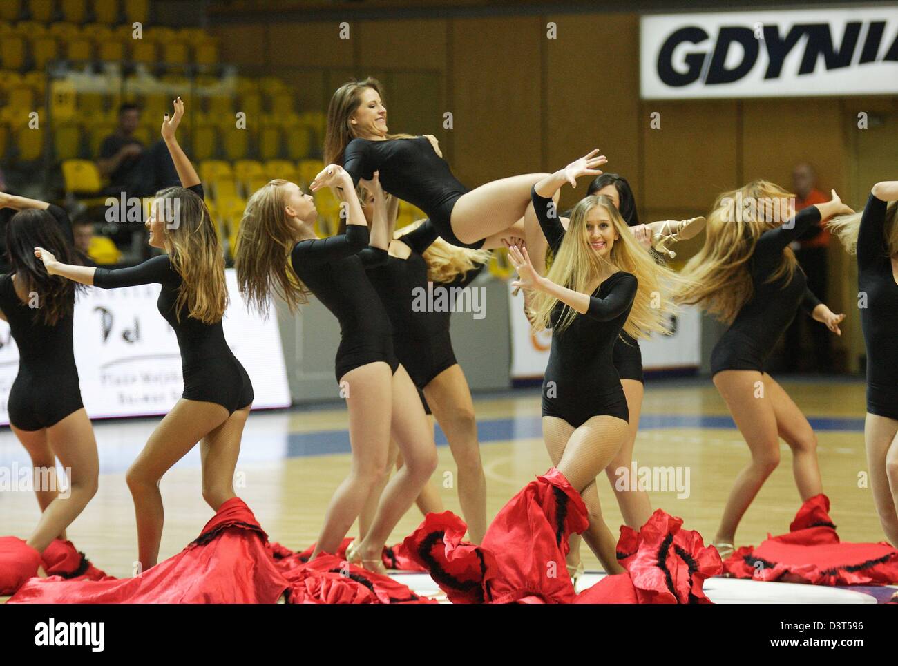 Poland 24th, February 2013 Handball: Final Four of the PGNiG Polish Cup. Vistal Laczpol Gdynia v KPR Ruch Chorzow game for 3th place in the Cup at HSW sports hall in Gdynia.The 'Gdynia Cheerleaders' perform during the half-time Stock Photo