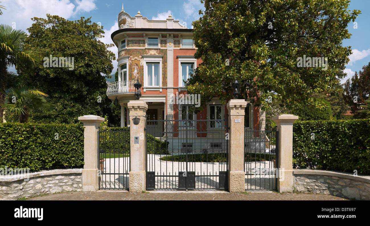 Toscolano-Maderno, Italy, villa with garden and prestigious entrance portal Stock Photo