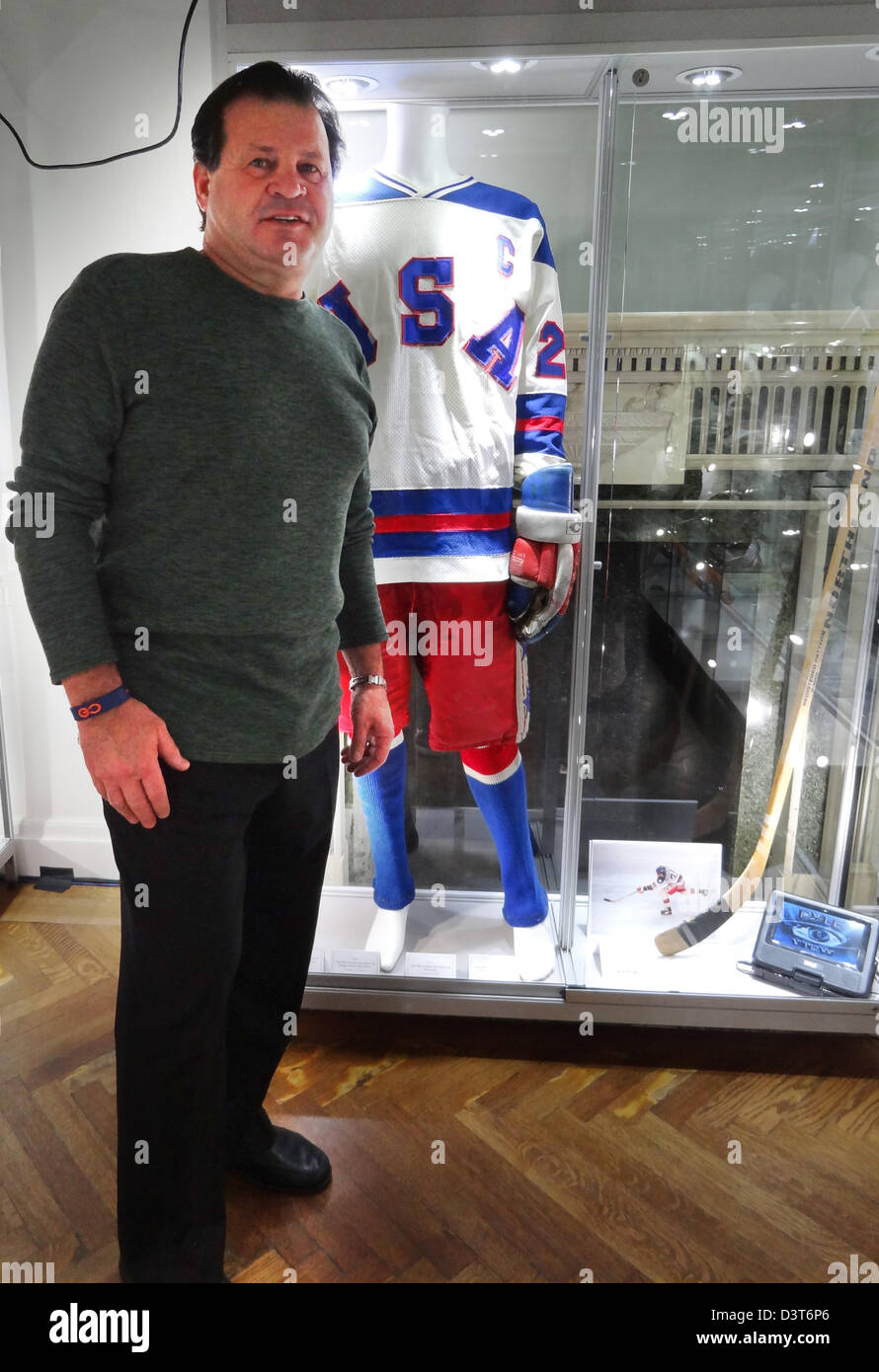 Former US Ice hockey player Mike Eruzione poses in front of his jersey (R) which was auctioned in New York, United States, 23 February 2013. Mike Eruzione wore the shirt during the 1980 Winter Olympics when he was captain of the US ice hockey national team. The United States team, made up of amateur and collegiate players, defeated the Soviet team, who had won nearly every world championship and Olympic tournament since 1954. The 'Miracle on Ice' is one of the Top Sports Moment of the 20th Century. The jersey was sold for 657,250 dollars (498,000 euros). Photo: Nezih Payzin Stock Photo