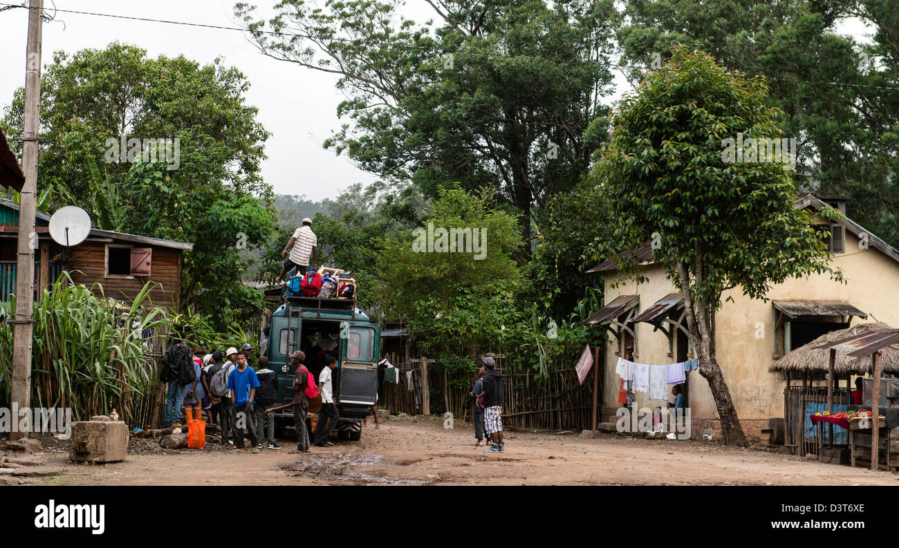 Malagasy people loading a van in Andasibe village or Perinet Madagascar Stock Photo