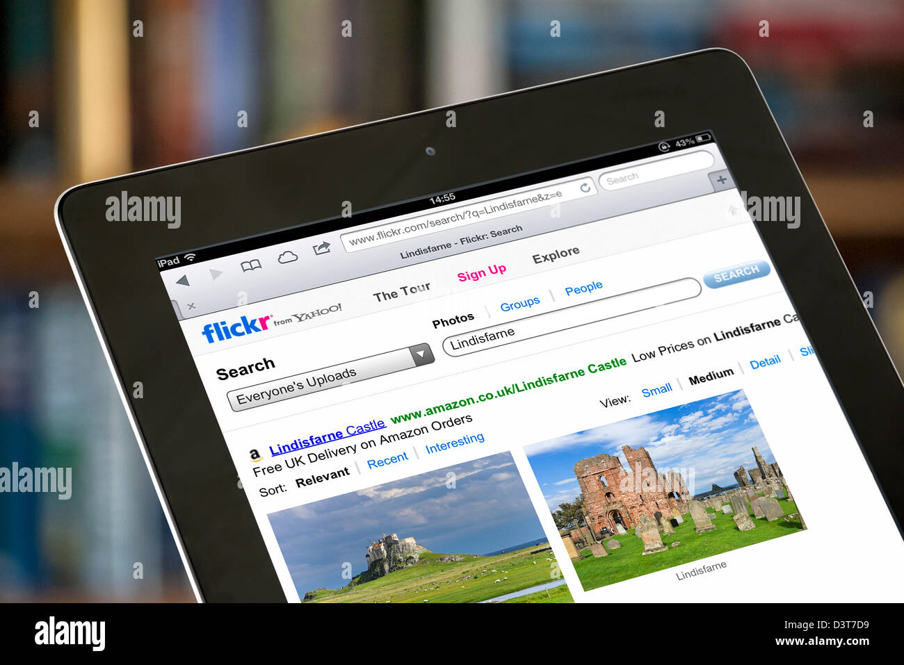 Photos on the Flickr photo sharing website viewed on a 4th generation iPad Stock Photo