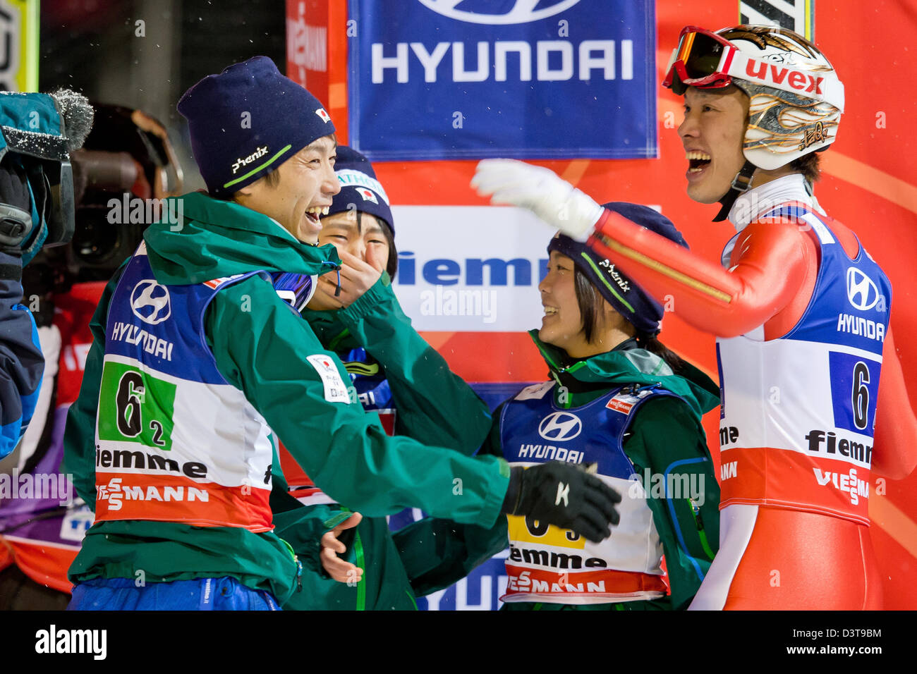 L-r) Daiki Ito, Yuki Ito, Sara Takanashi and Taku Takeuchi of Japan  celebrate after the final competition jump in the mixed team normal hill  ski jumping at the Nordic Skiing World Championships