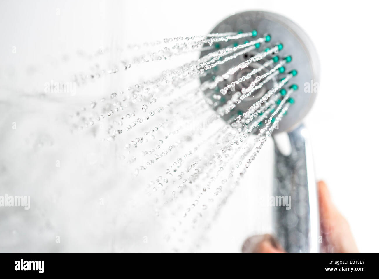 Water splashing out of a shower head Stock Photo Alamy