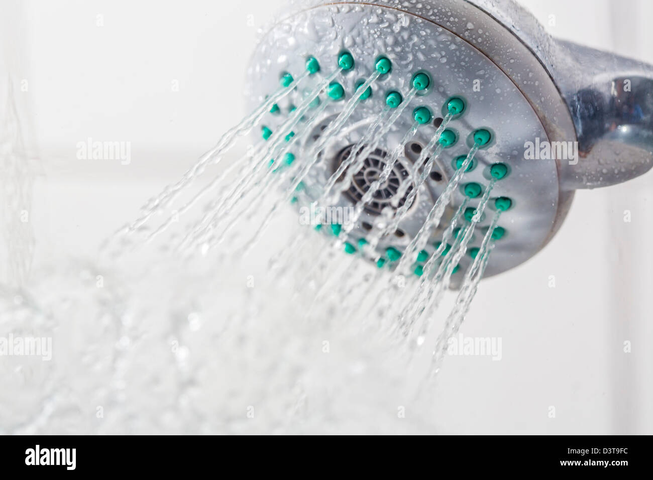 Water splashing out of a shower head Stock Photo Alamy