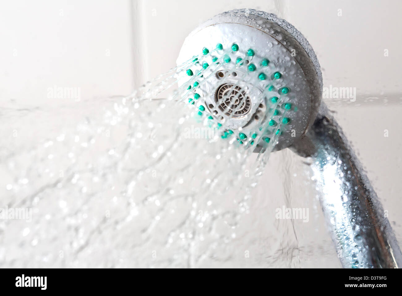 Water splashing out of a shower head Stock Photo Alamy