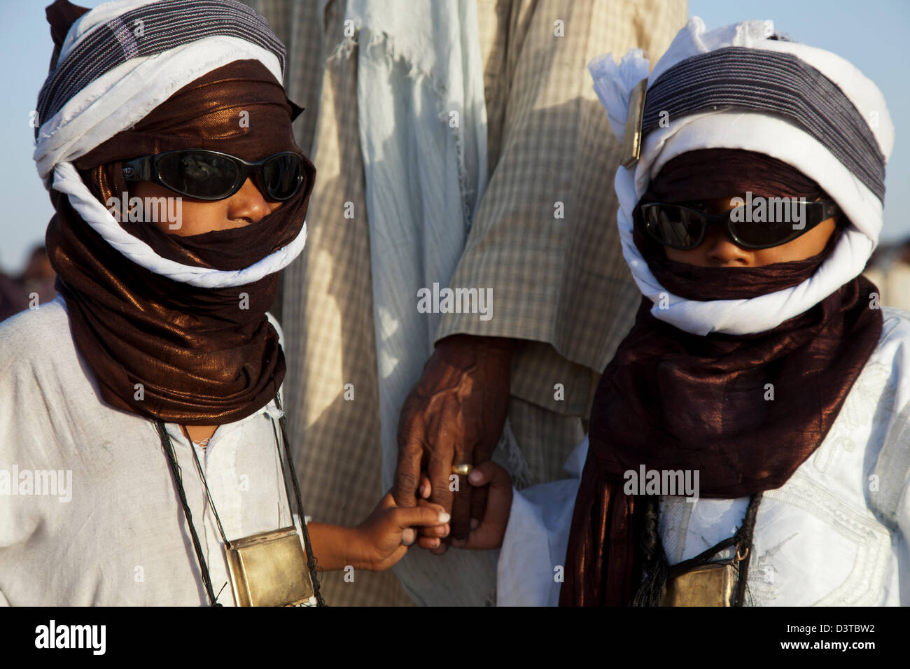 Tuaregchildren withe their father at Gerewol festival in northern Niger Stock Photo