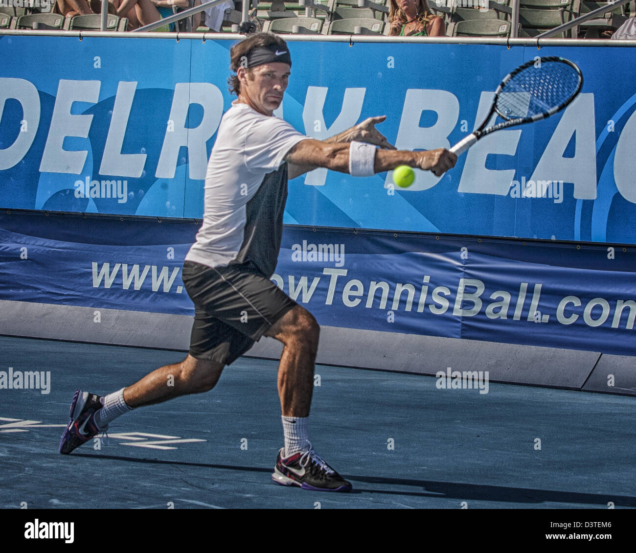 Delray Beach, Florida, U.S. 24th Feb, 2013.  Carlos Moya became the first two-time ATP Champions Tour winner at the Delray Beach ITC when he defeated Hall of Famer John McEnroe 6-4, 6-2 Sunday in the final of the three day tournament. The International Tennis Championships is an ATP World Tour 250 series men's tennis tournament held every year in Delray Beach, Florida. Nike sponsored athlete Carlos Moya. (Credit Image: Credit:  Arnold Drapkin/ZUMAPRESS.com/Alamy Live News/Alamy Live News) Stock Photo