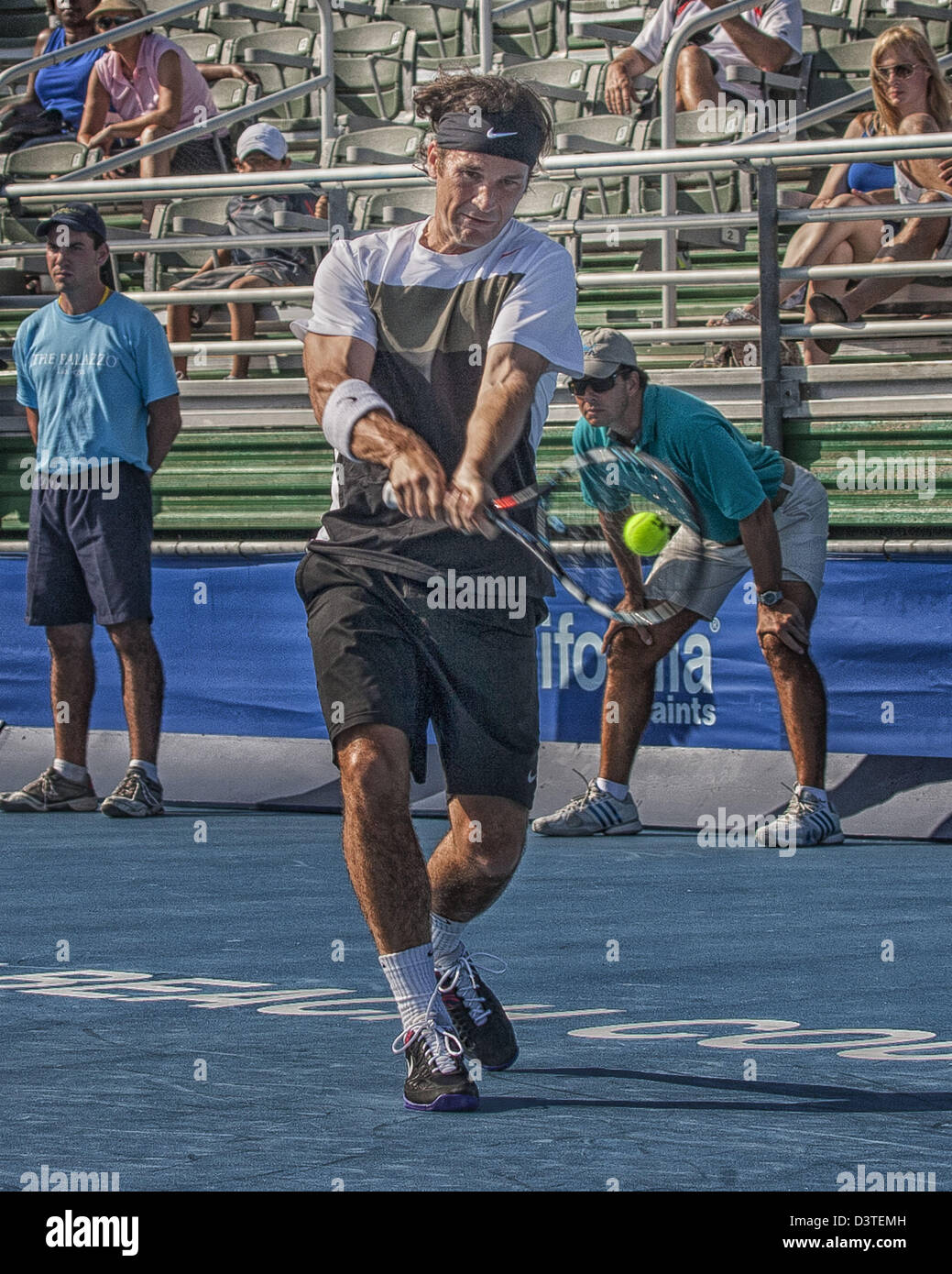 Delray Beach, Florida, U.S. 24th Feb, 2013.  Carlos Moya became the first two-time ATP Champions Tour winner at the Delray Beach ITC when he defeated Hall of Famer John McEnroe 6-4, 6-2 Sunday in the final of the three day tournament. The International Tennis Championships is an ATP World Tour 250 series men's tennis tournament held every year in Delray Beach, Florida. Nike sponsored athlete Carlos Moya. (Credit Image: Credit:  Arnold Drapkin/ZUMAPRESS.com/Alamy Live News/Alamy Live News) Stock Photo