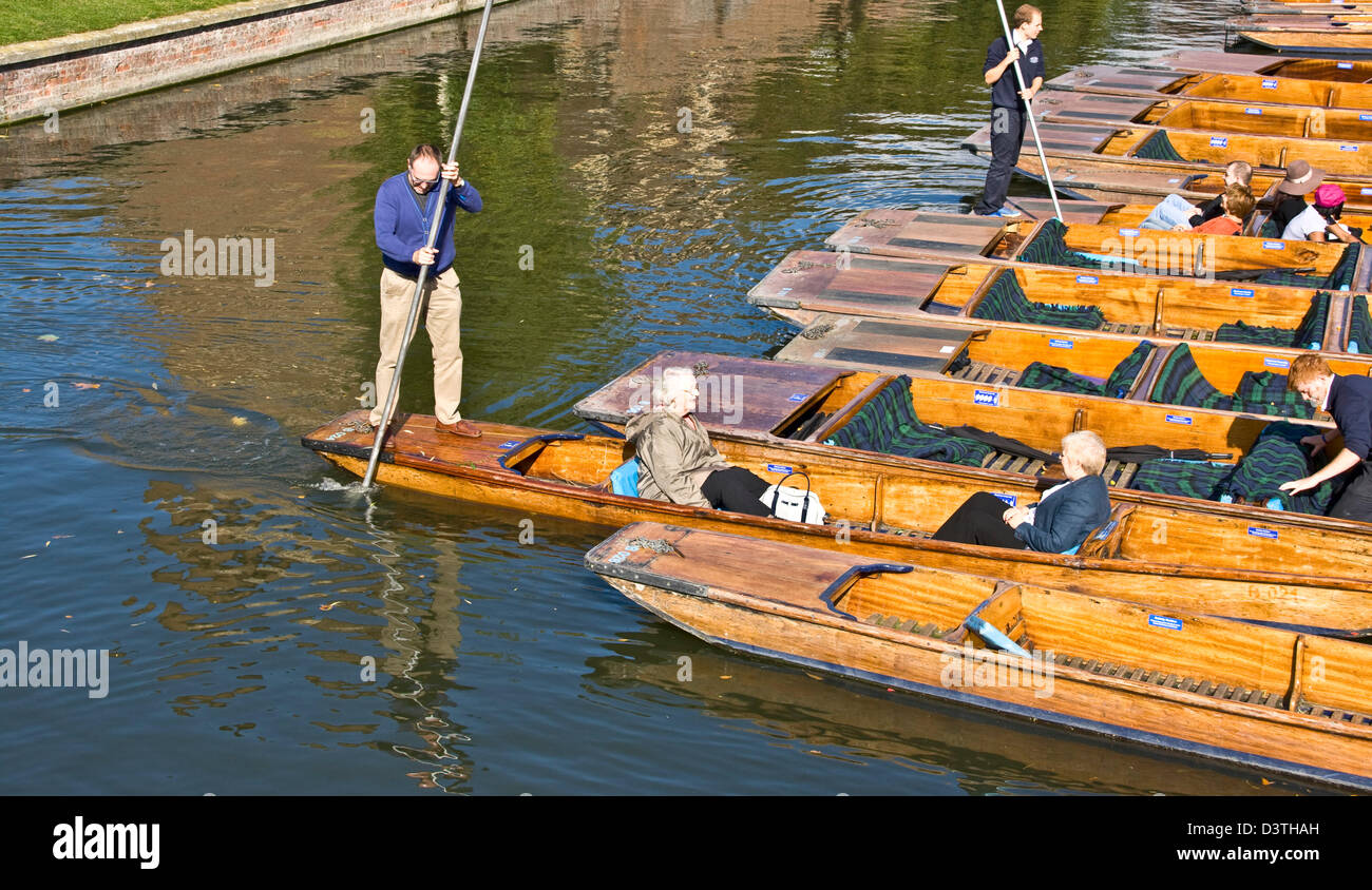 Tourists in punts on The Backs River Cam Cambridge Cambridgeshire England Europe Stock Photo