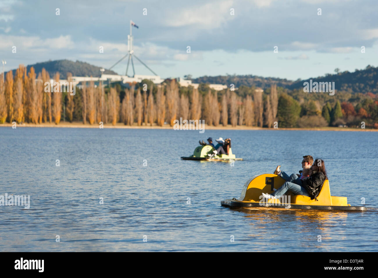 Family on pedalo (paddleboat) on Lake Burley Griffin. Canberra, Australian Capital Territory