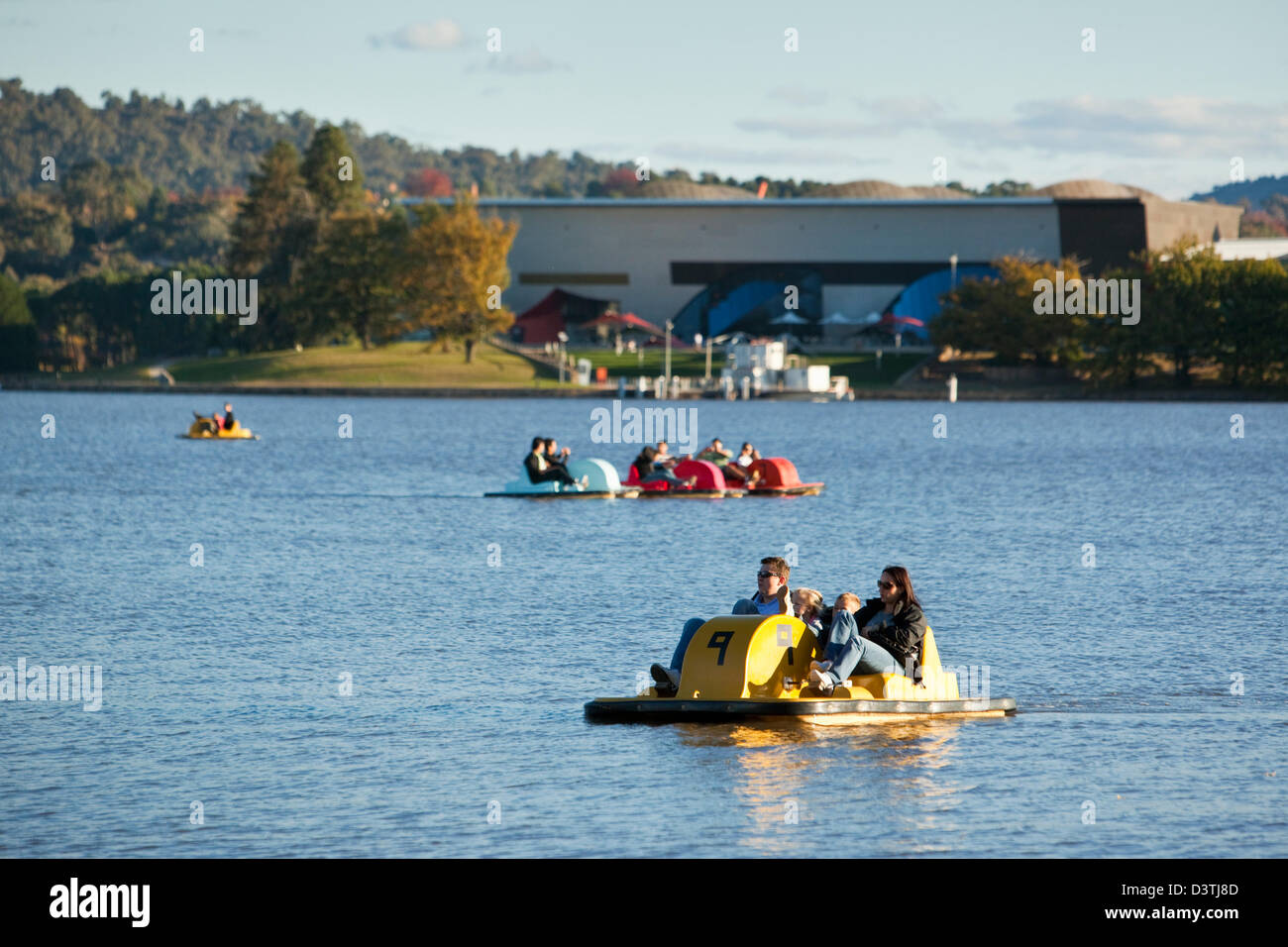Family on pedalo (paddleboat) on Lake Burley Griffin. Canberra, Australian Capital Territory