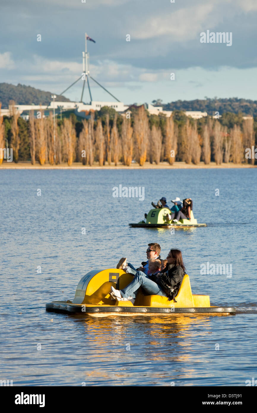 Family on pedalo (paddleboat) on Lake Burley Griffin.  Canberra, Australian Capital Territory (ACT), Australia Stock Photo