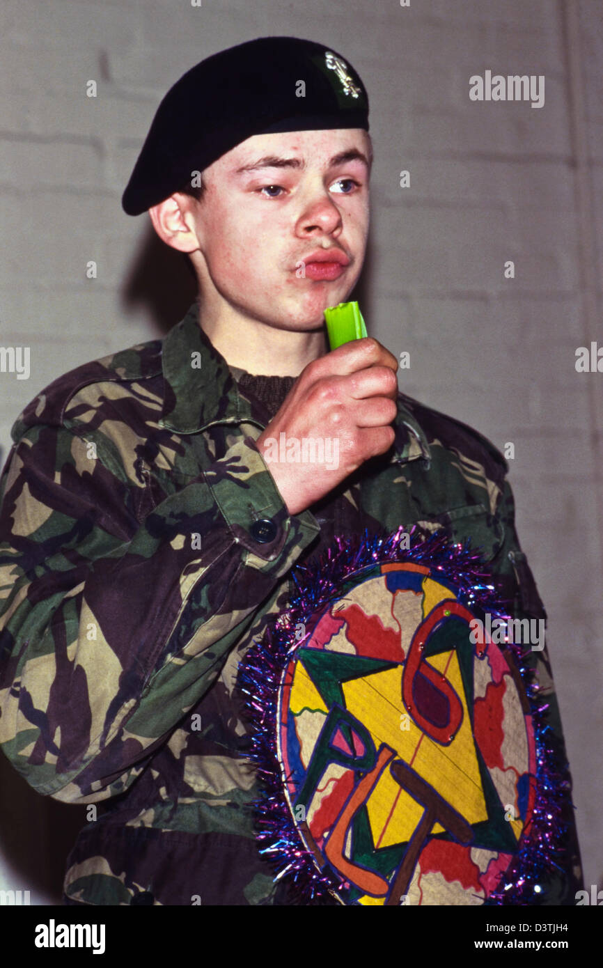 Soldier eating leek during St Davids Day leek ceremony at 3rd Battalion