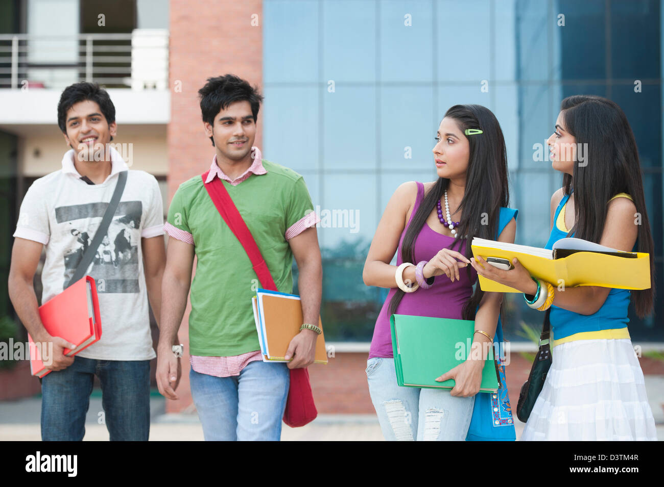 University students walking in university campus Stock Photo - Alamy