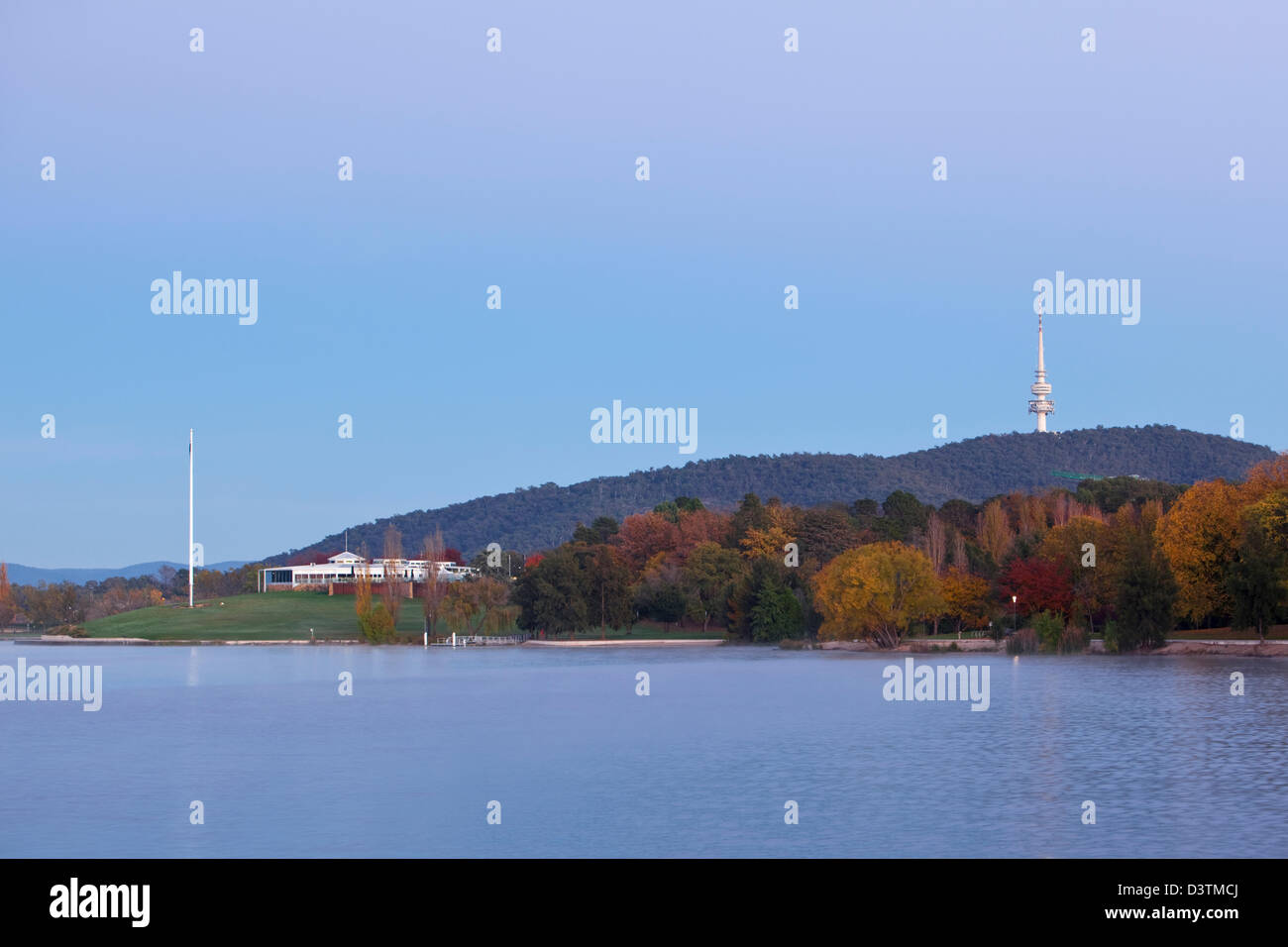 View along Lake Burley Griffin to the National Capital Exhibition building, Commonwealth Park and Black Mountain Tower. Canberra Stock Photo