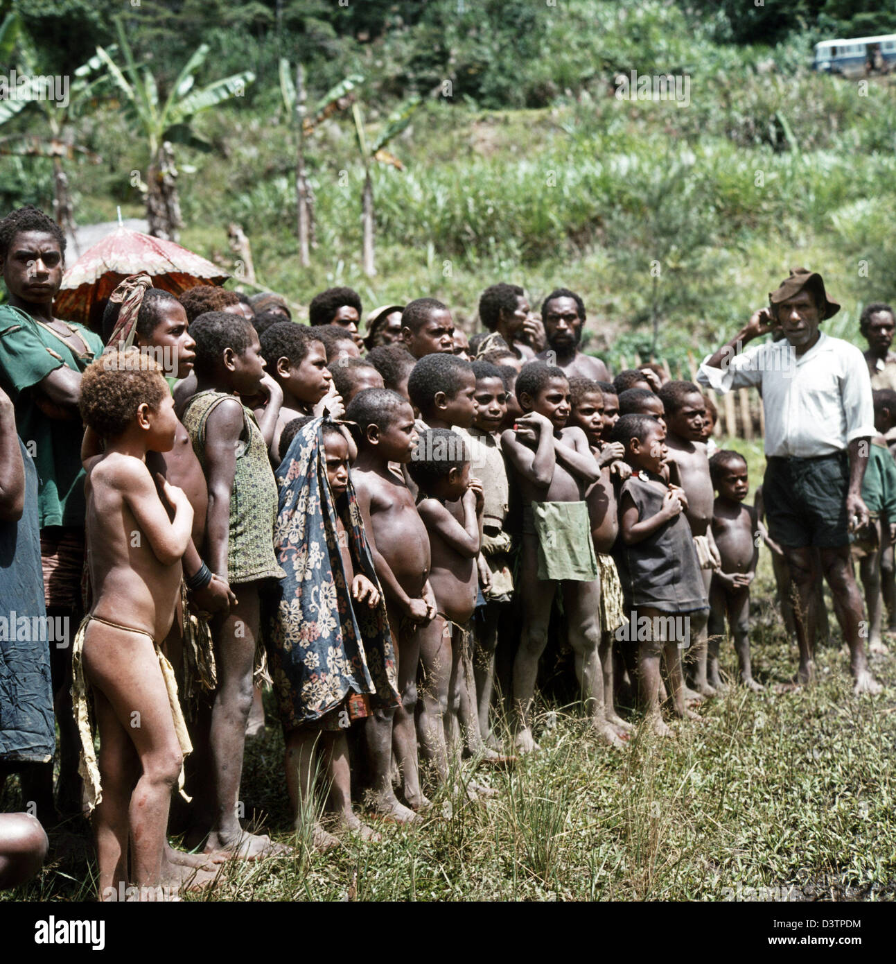 The undated picture shows naked school children with their teacher near  Mendi, Papua New Guinea. The population of Papua New Guinea, consisting  mainly of Papuas, is very diverse. The Papuas are hunters,