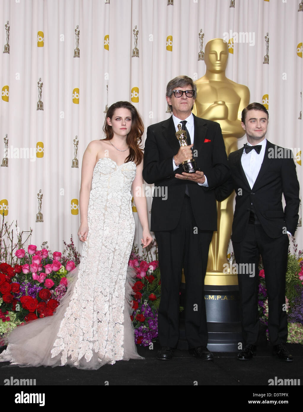 KRISTEN STEWART & RICK CARTER & DANIEL RADCLIFFE 85TH ACADEMY AWARDS PRESSROOM DOLBY THEATRE LOS ANGELES CALIFORNIA USA 24 Fe Stock Photo