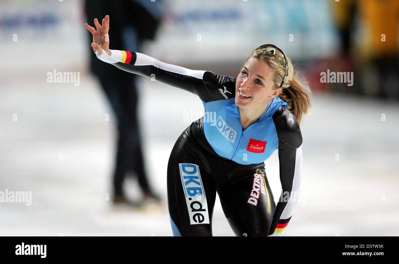 German speed skater Anni Friesinger cheers after winning the women's 1,000 metre competition of the speed skating world cup in Berlin, Germany, 19 November 2006. Photo: Gero Breloer Stock Photo