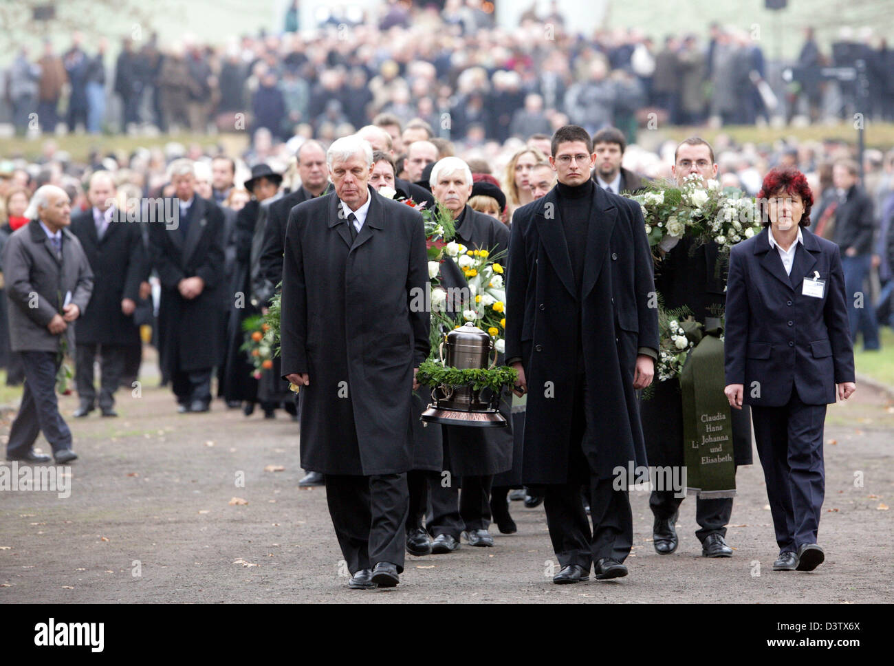 The urn of former GDR espionage governor Markus Wolf is carried to its grave in Berlin, Germany, Saturday, 25 November 2006. Wolf died on 9 November 2006, a special date in Germany, aged 83. Hundreds of people followed the funeral procession of Wolf, who was over 30 years responsible for 4,000 GDR exterior agents in the Cold War. Photo: Gero Breloer Stock Photo