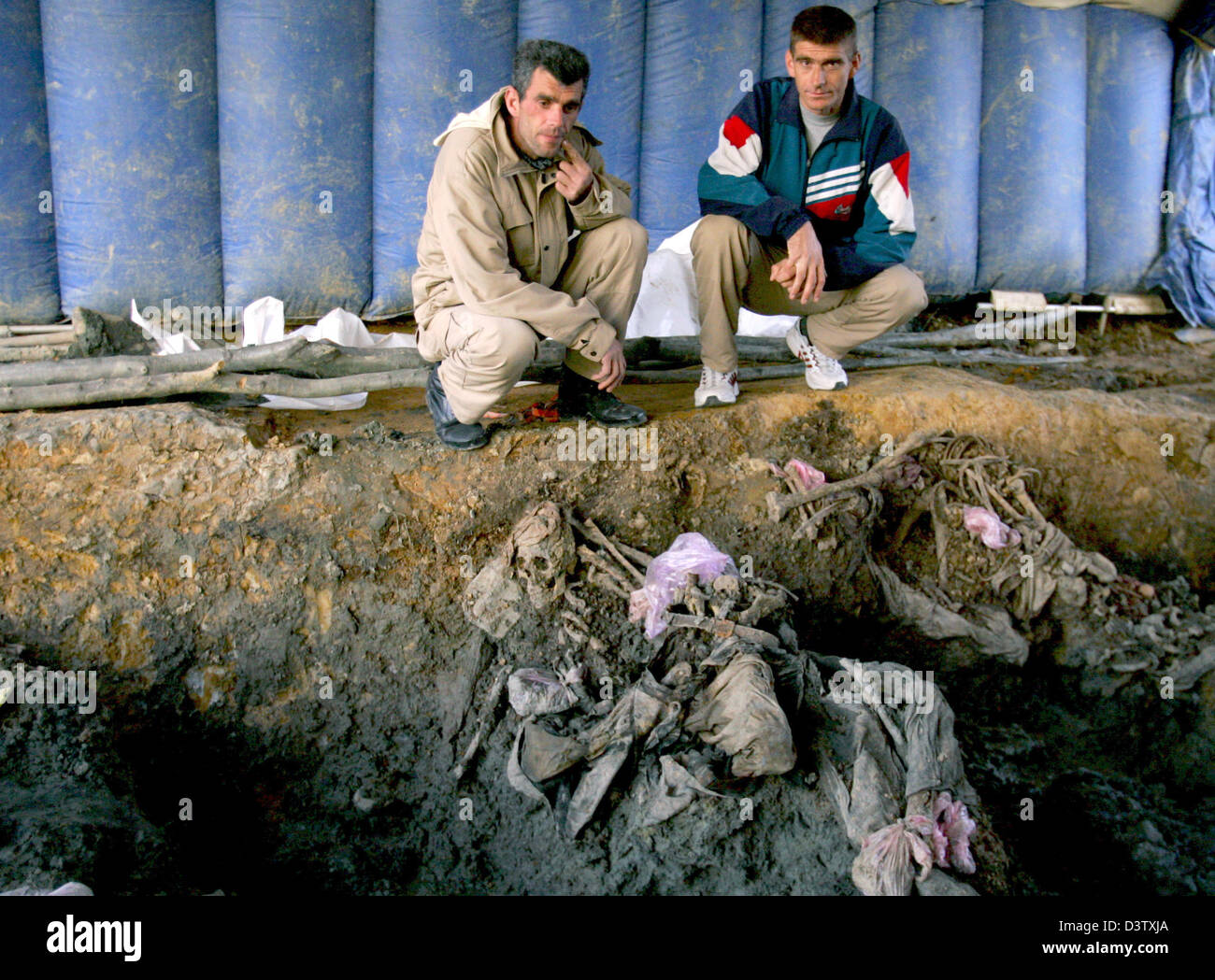 A common grave in Snagovo near Zvornik, Bosnia and Herzegovina, 15 November 2006. Zvornik is located near Srebrenica at the border to Serbia. The city's number of inhabitants went down to 21,000, mostly Serbs and Serbian refugees from the Bosnian-Croatian Federation. The city set the sad scene for the massacre in July 1995, when Bosnian Serbs under the commando of General Ratko Mla Stock Photo