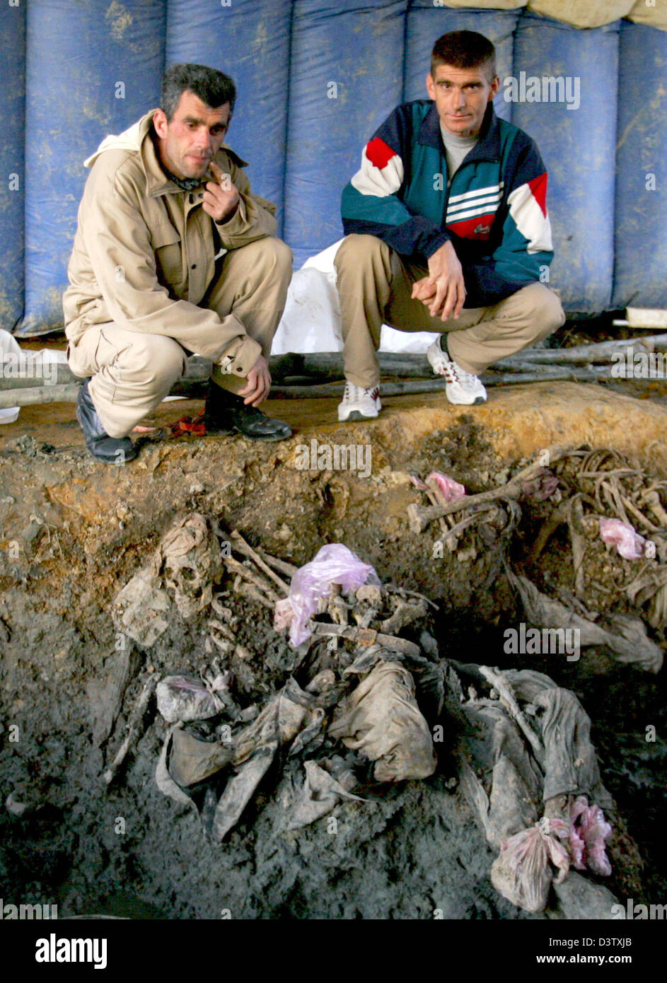 A common grave in Snagovo near Zvornik, Bosnia and Herzegovina, 15 November 2006. Zvornik is located near Srebrenica at the border to Serbia. The city's number of inhabitants went down to 21,000, mostly Serbs and Serbian refugees from the Bosnian-Croatian Federation. The city set the sad scene for the massacre in July 1995, when Bosnian Serbs under the commando of General Ratko Mla Stock Photo