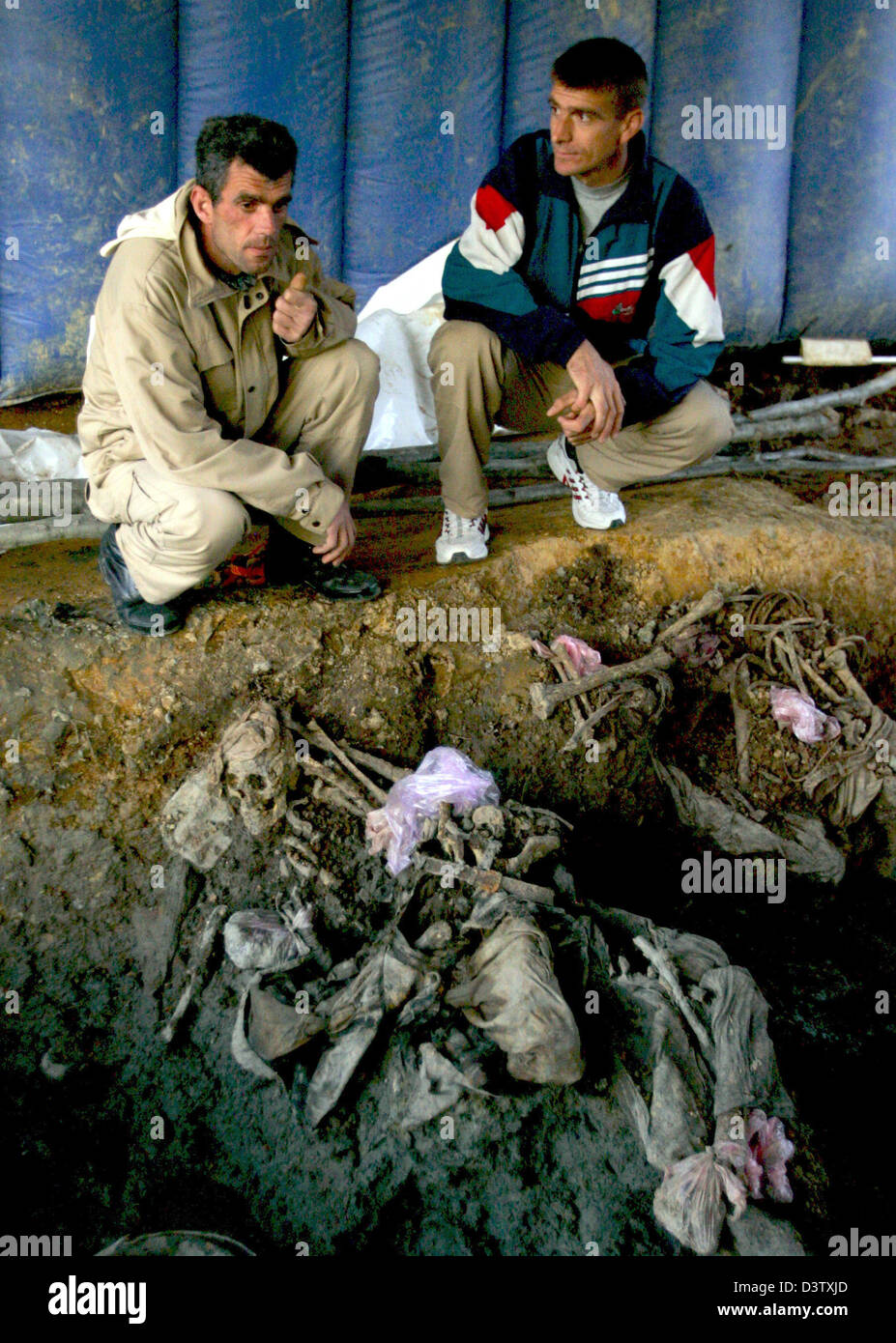 A common grave in Snagovo near Zvornik, Bosnia and Herzegovina, 15 November 2006. Zvornik is located near Srebrenica at the border to Serbia. The city's number of inhabitants went down to 21,000, mostly Serbs and Serbian refugees from the Bosnian-Croatian Federation. The city set the sad scene for the massacre in July 1995, when Bosnian Serbs under the commando of General Ratko Mla Stock Photo