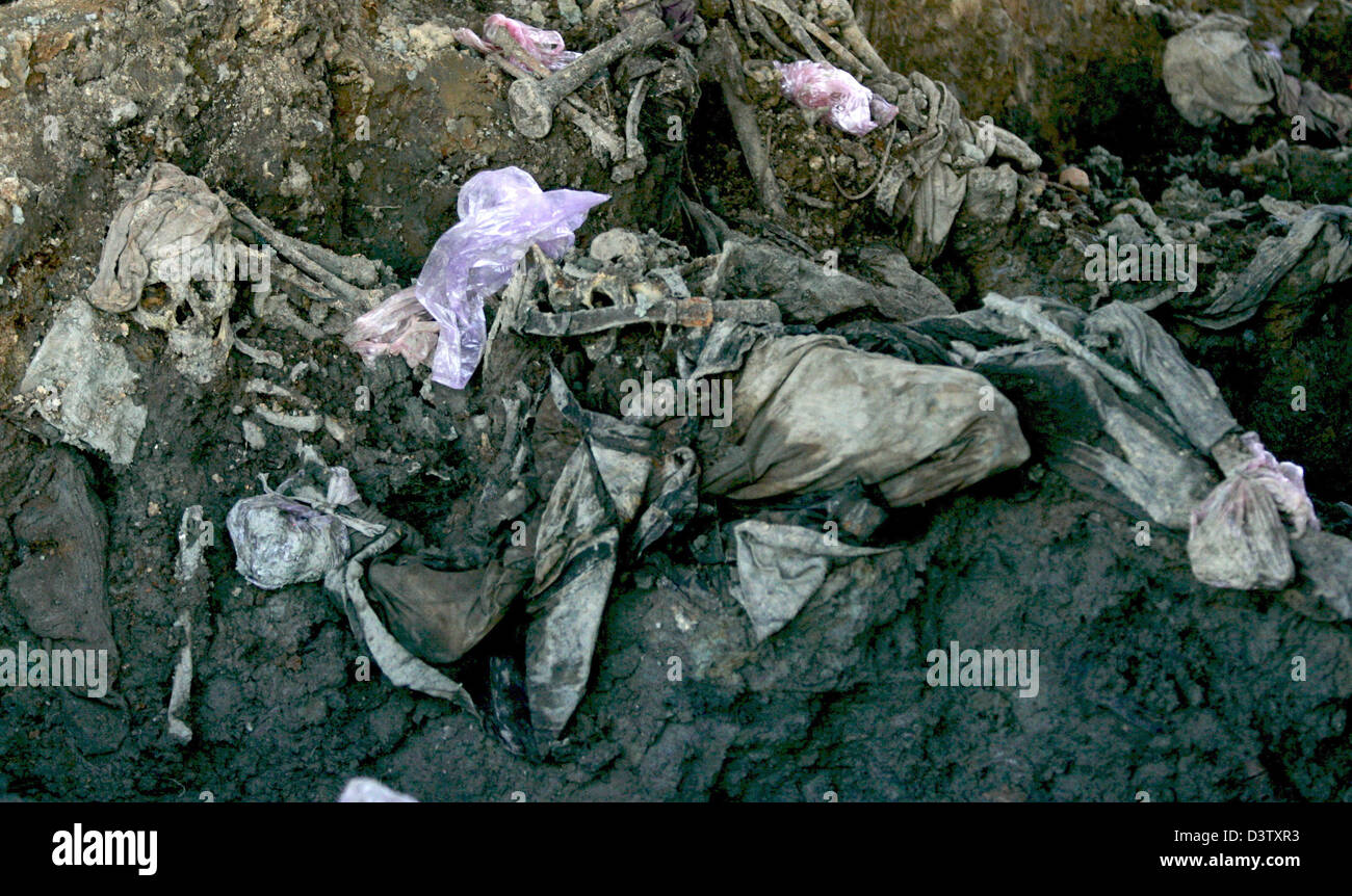 A picture shows mortal remains in a common grave in Snagovo near Zvornik, Bosnia and Herzegovina, 15 November 2006. Zvornik is located near Srebrenica at the border to Serbia. The city's number of inhabitants went down to 21,000, mostly Serbs and Serbian refugees from the Bosnian-Croatian Federation. The city set the sad scene for the massacre in July 1995, when Bosnian Serbs under Stock Photo