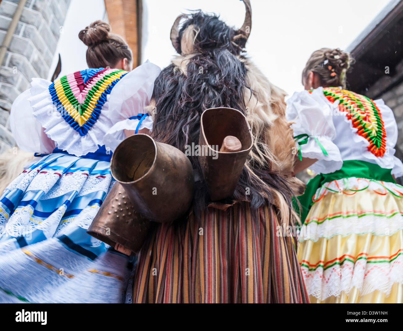 Detail of the dresses and cowbell of the trangas and madamas costumes