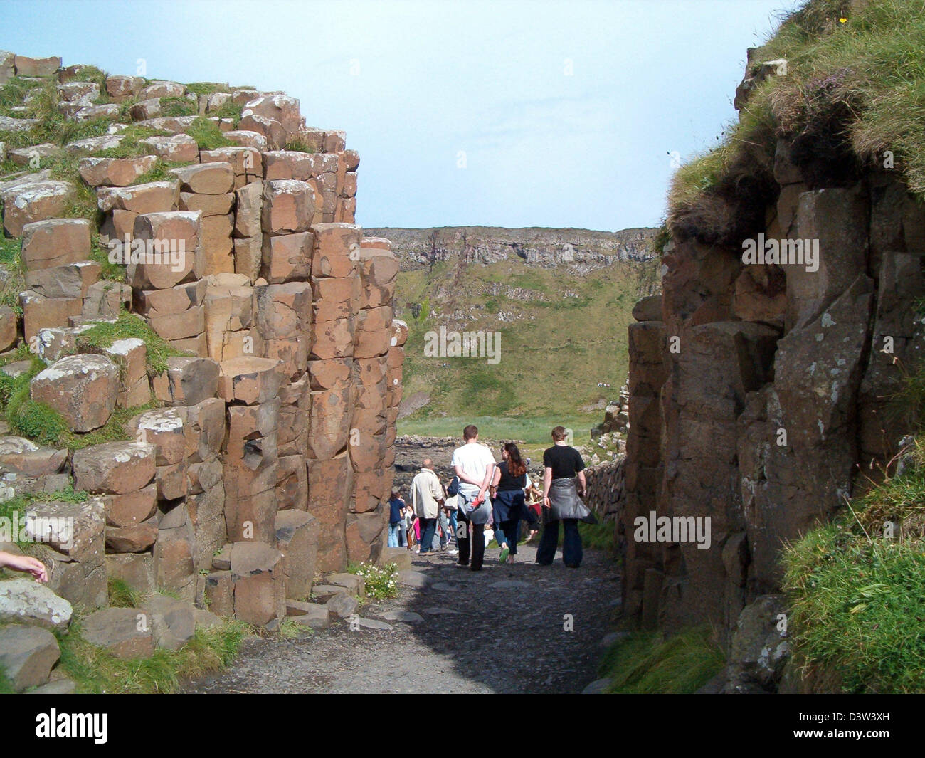 Walk Through Rocks Tour (dpa - files) Tourists walk through a passage between rocks in Northern ...