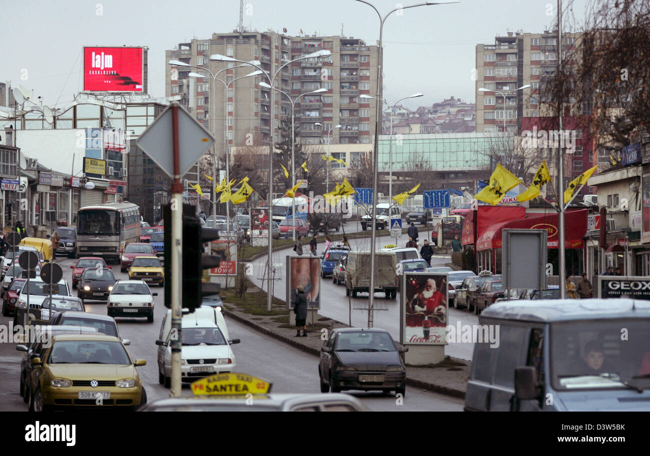 The traffic is pictured in the capital of the Kosovo, Pristina, Serbia, 11 December 2006. Administrated by the UN the Kosovo forms part of Serbia under international law. Pristina, as the third-biggest city of Serbia, is the biggest city of the Kosovo and its political, economic and cultural centre. The international missions of the UN, the EU and the OECD have their headquarters h Stock Photo