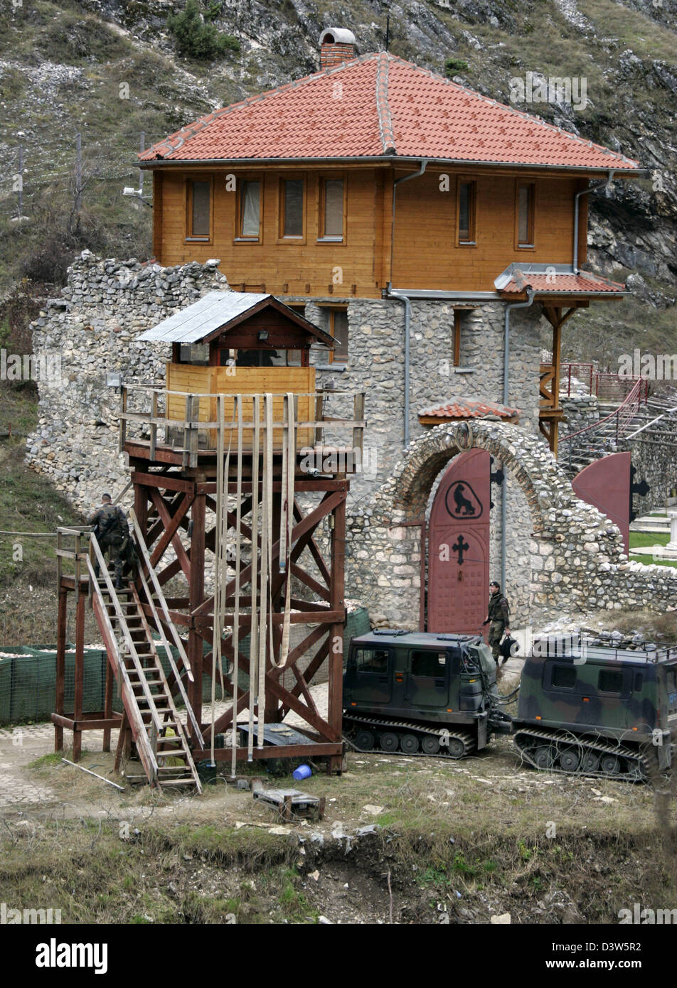 The Archangel Monastery is guarded by the German Bundeswehr in Prizren, Kosovo, 11 December 2006. The monastery is located at the Prizrenska Bistrica river valley in the southern part of Kosovo. South of the valley crowns the 2,000 metres high Sar Planina mountains to form a natural border between Serbia and Montenegro. The monastery sanctified to the archangels Michael and Gabriel Stock Photo