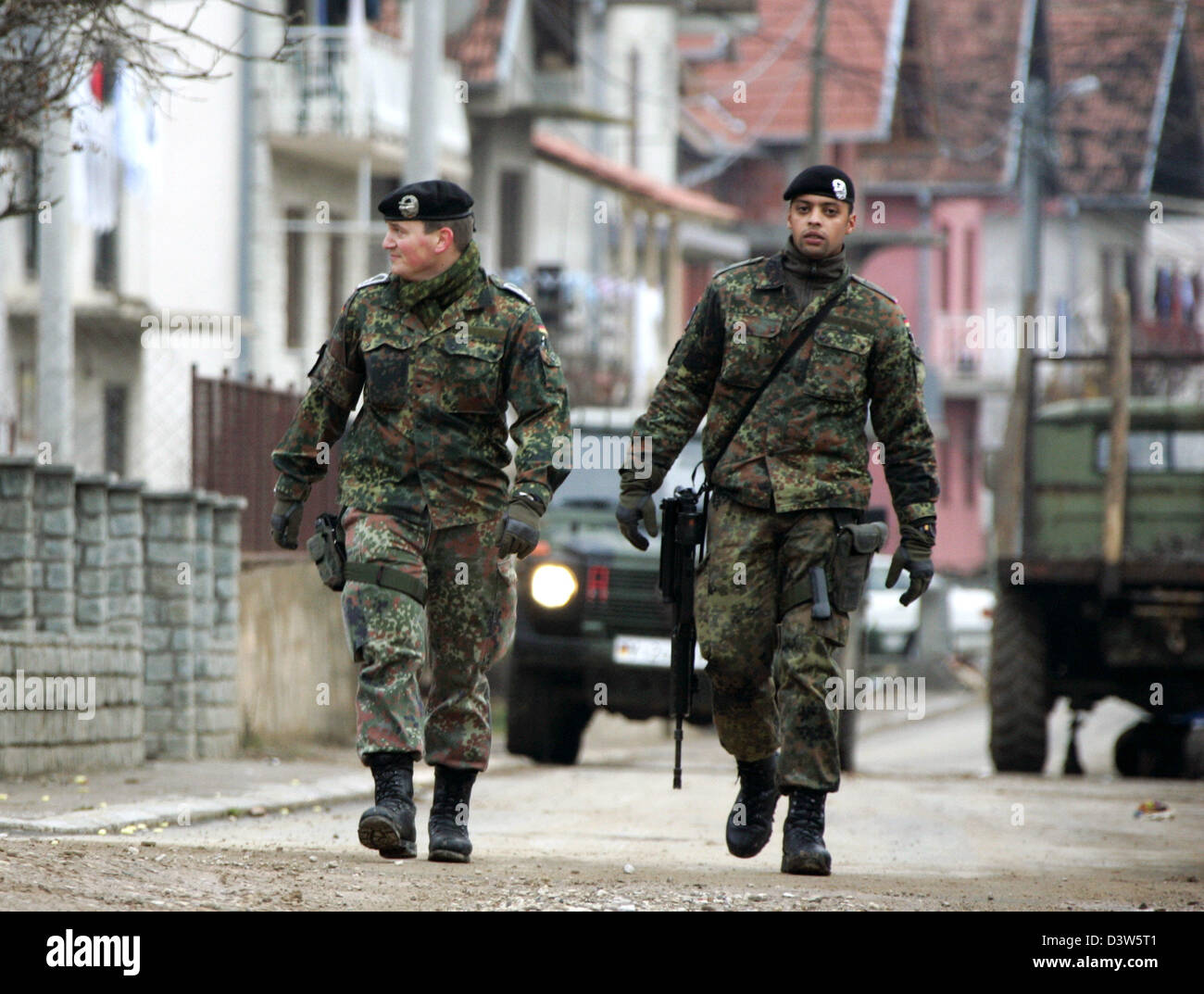 German Bundeswehr soldiers patrol the village Mitrovic, Kosovo, 13 ...