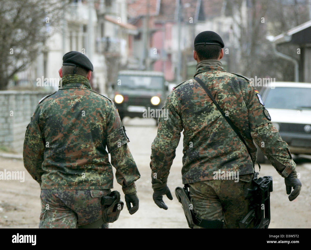 German Bundeswehr soldiers patrol the village Mitrovic, Kosovo, 13 ...