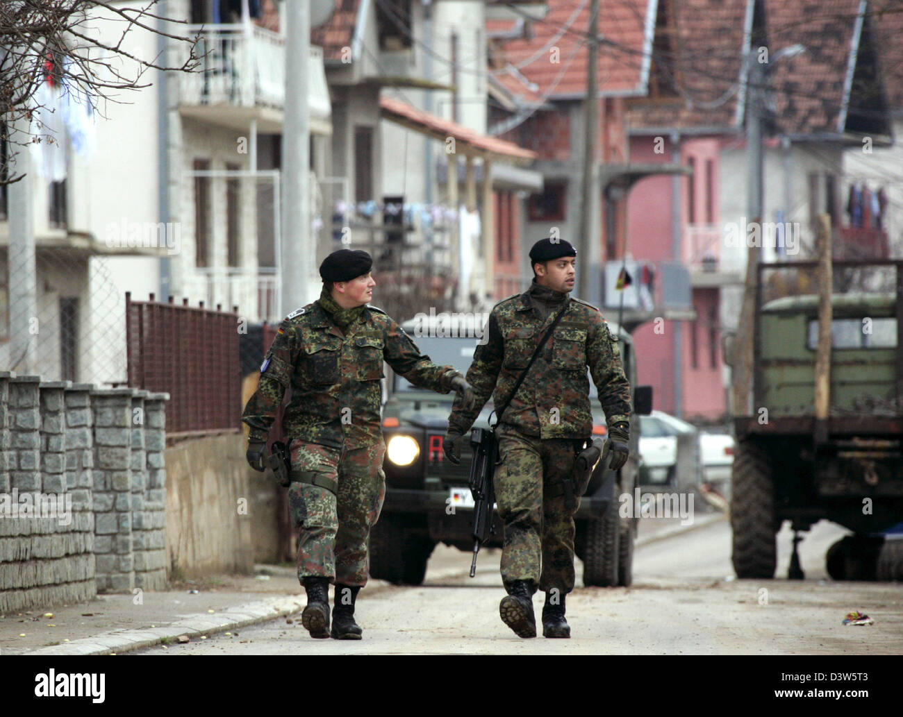 German Bundeswehr soldiers patrol the village Mitrovic, Kosovo, 13 ...
