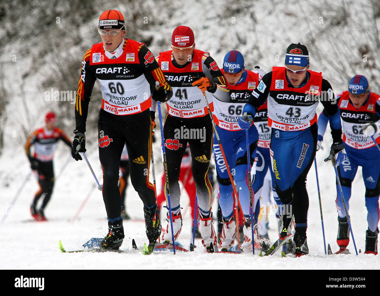 German cross-country skiers Tobias Angerer (2ndL) and Jens Filbrich (L) pictured during the 20km pursuit in Oberstdorf, Germany, Tuesday, 2 January 2007. Angerer finished 3rd as the best German. The Tour de Ski second stage in Oberstdorf is followed by the final stages in Asiago and Val di Fiemme (both Italy) until 7th January 2007. Photo: Karl-Josef Hildenbrand Stock Photo