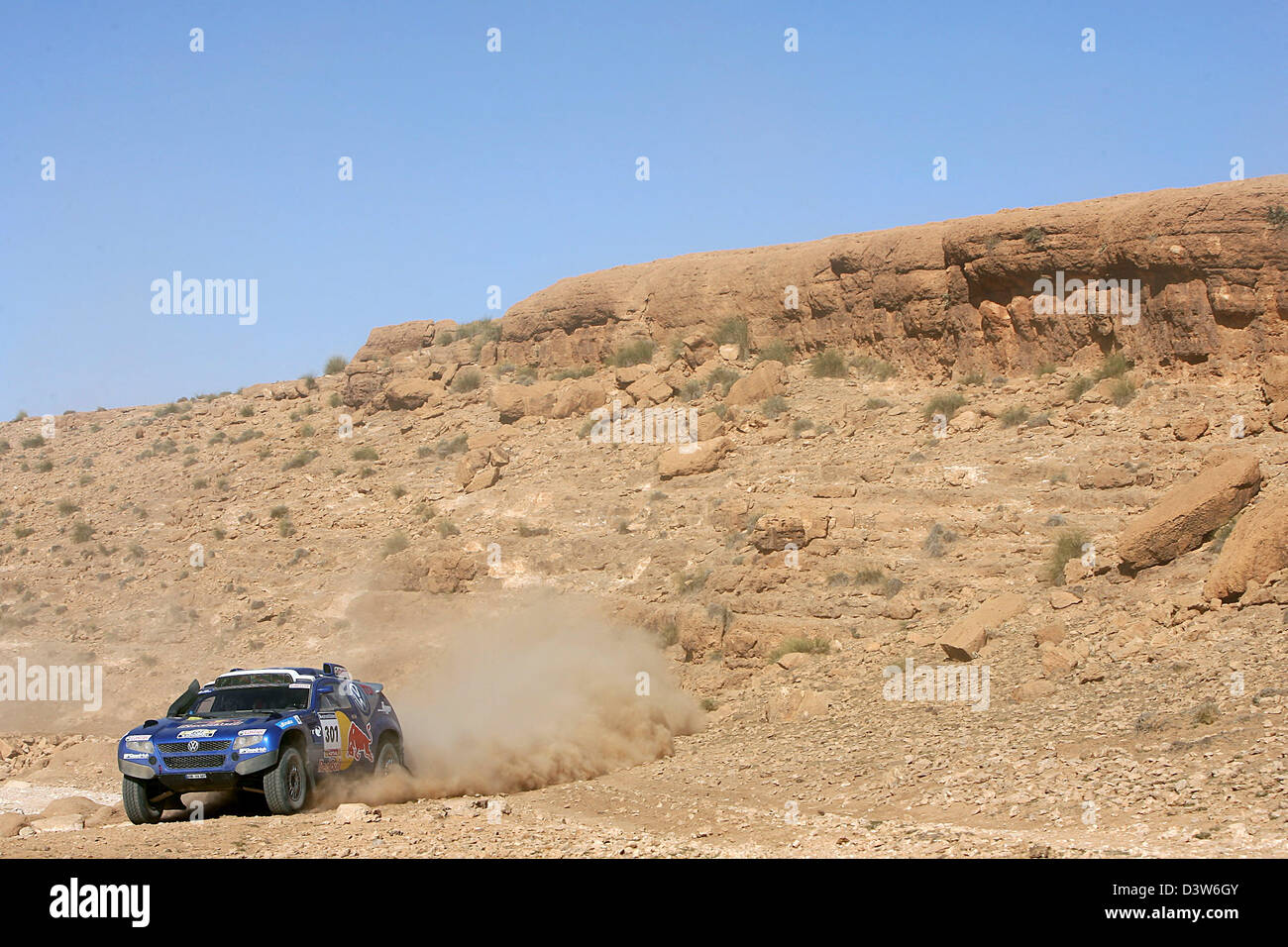 South African rallye pilot Giniel de Villiers paces his Volkswagen Race