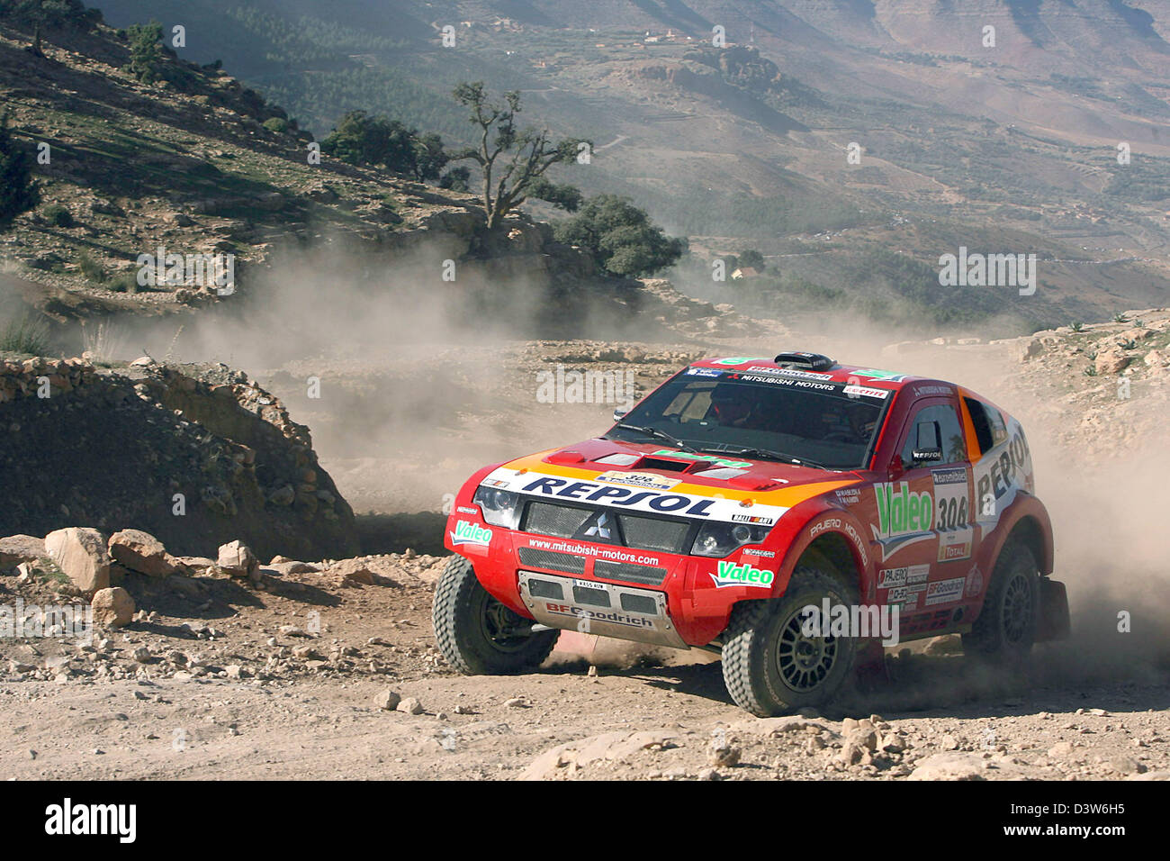 Japanese rallye pilot Hiroshi Masuoka paces his Mitsubishi through the ...