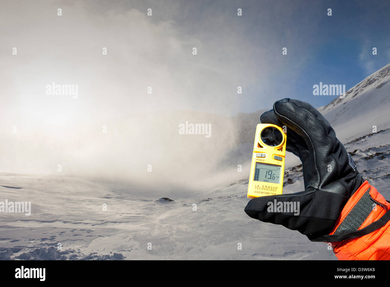 Drifting snow in Coire an Sneachda in the Cairngorm mountains, Scotland, UK, with a mountaineers anemometer Stock Photo