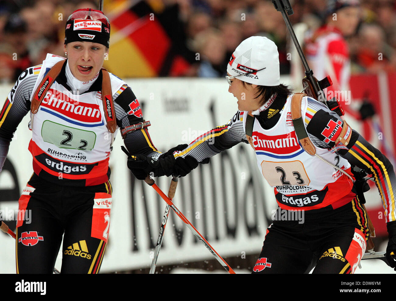 German Simone Denkinger changes over for Magdalena Neuner (L) during the Biathlon World Cup women's 6k relay event in Ruhpolding, Germany, Wednesday, 10 January 2007. Russia produced the finest shooting performance of the season to win the fourth World Cup women's relay of the campaign in Ruhpolding ahead of the German team. Photo: Andreas Gebert Stock Photo