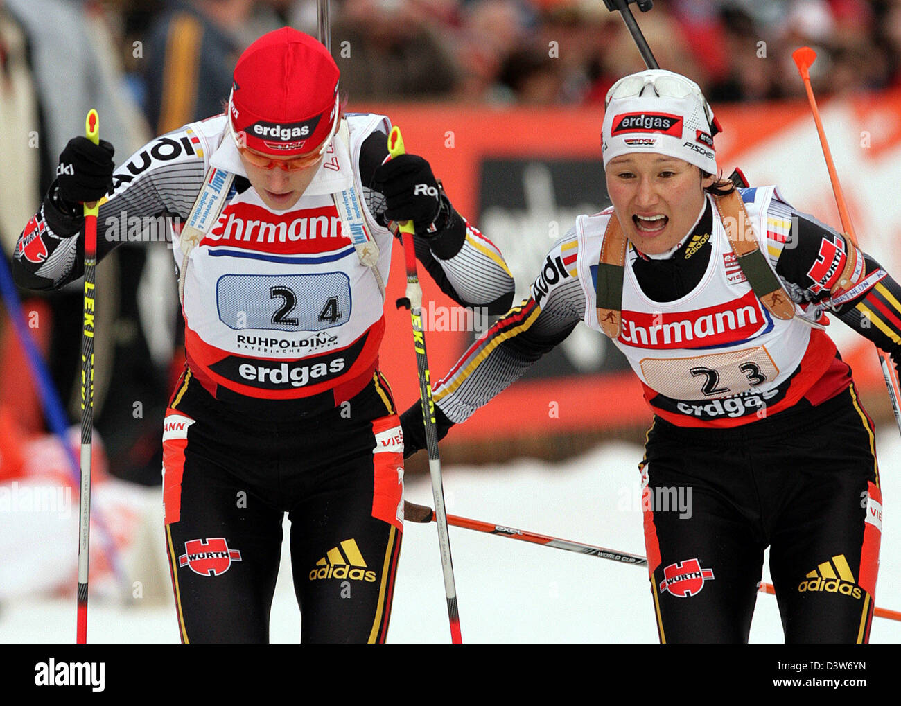 German Kati Wilhelm (L) changes over for Simone Denkinger during the Biathlon World Cup women's 6k relay event in Ruhpolding, Germany, Wednesday, 10 January 2007. Russia produced the finest shooting performance of the season to win the fourth World Cup women's relay of the campaign in Ruhpolding ahead of the German team. Photo: Andreas Gebert Stock Photo